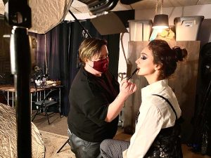 Alexandria is on the photoshoot set of Chanel & Pearls.